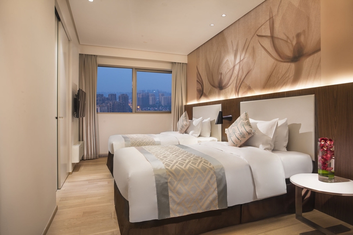 Imagen de la habitación del Aparthotel EVEN Hotel Zhongshan City Center. Foto 7