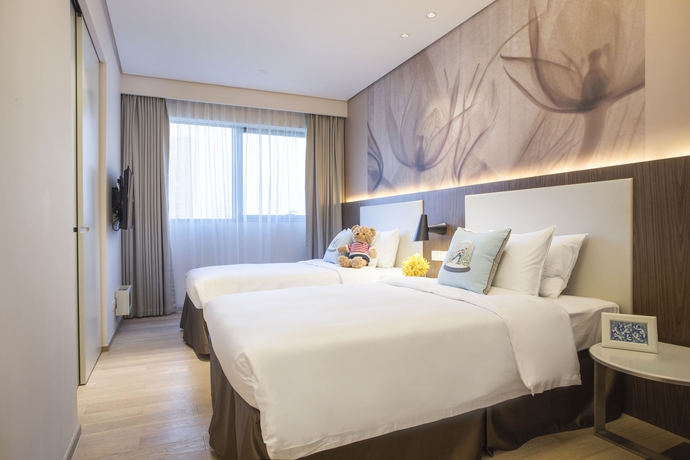 Imagen de la habitación del Aparthotel EVEN Hotel Zhongshan City Center. Foto 9