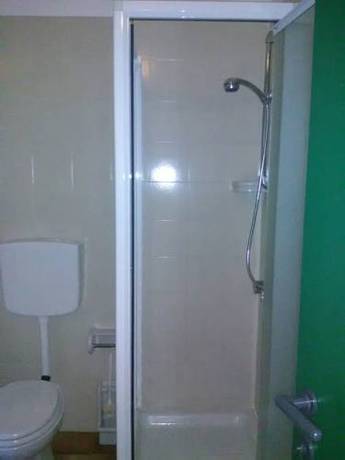 Imagen de la habitación del Aparthotel Eco Village Baia delle Ginestre. Foto 6