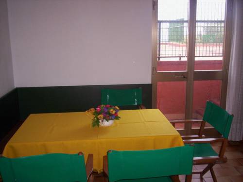 Imagen de la habitación del Aparthotel Eco Village Baia delle Ginestre. Foto 11