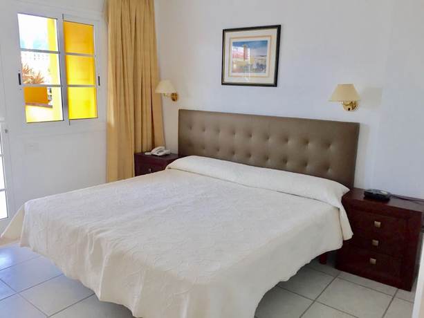 Imagen de la habitación del Aparthotel El Marques Palace. Foto 16