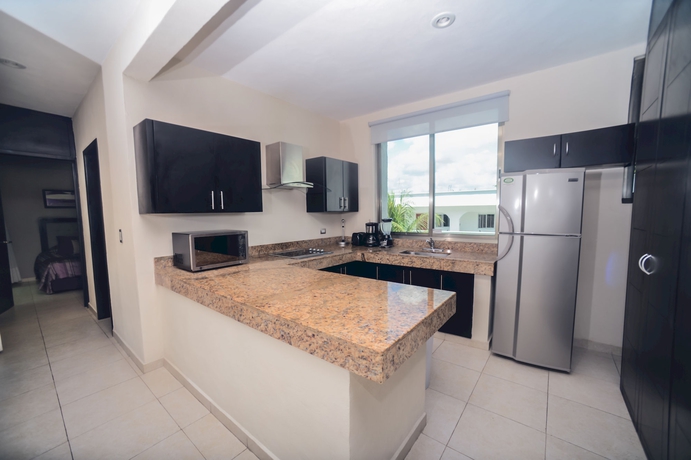 Imagen de la habitación del Aparthotel Encanto Riviera. Foto 6