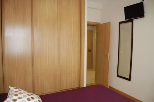 Imagen de la habitación del Aparthotel Encasa. Foto 14