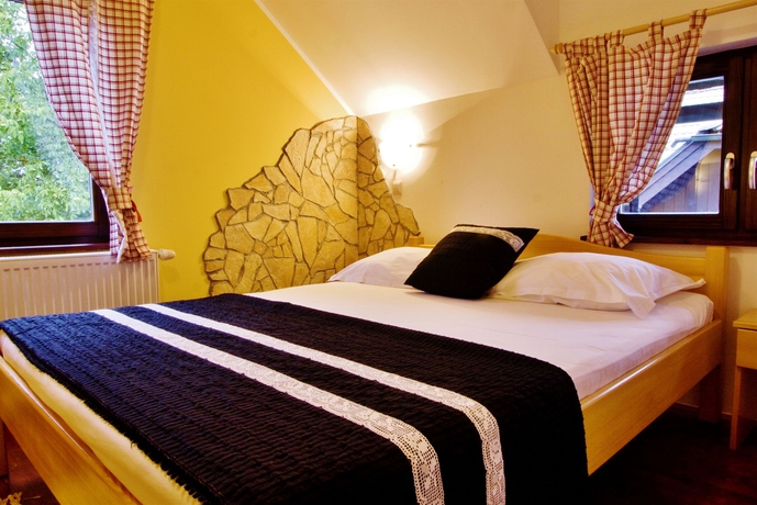 Imagen de la habitación del Aparthotel Etno Garden apartment and rooms. Foto 8
