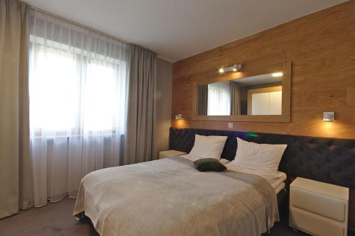 Imagen de la habitación del Aparthotel Forma Tatrica. Foto 4