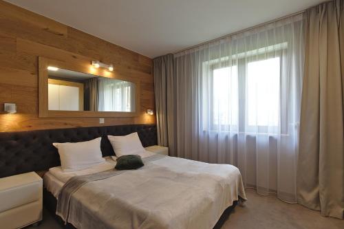 Imagen de la habitación del Aparthotel Forma Tatrica. Foto 8