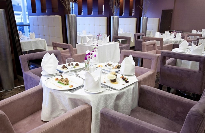 Imagen del bar/restaurante del Aparthotel Grand Belle Vue Hotel Apartment Dubai. Foto 6
