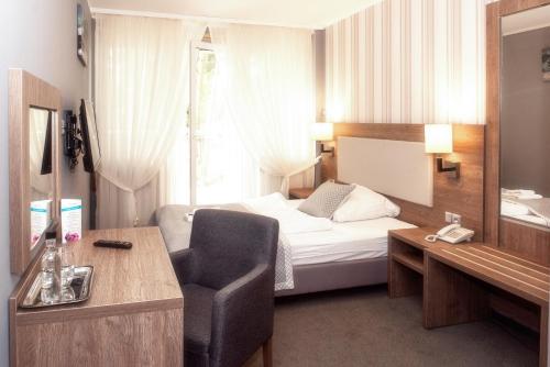 Imagen de la habitación del Aparthotel Grand Laola Spa. Foto 3