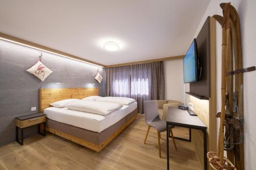Imagen de la habitación del Aparthotel Grischuna. Foto 8