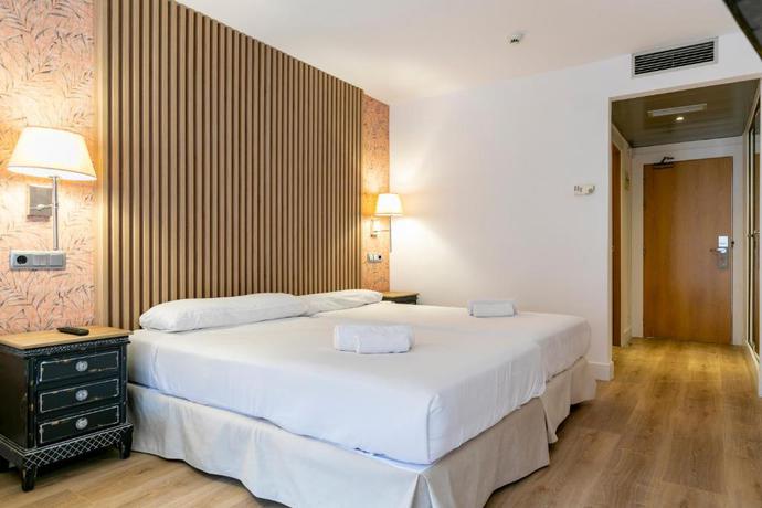 Imagen de la habitación del Aparthotel H-A Hotel Quo Eraso. Foto 7