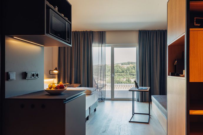 Imagen de la habitación del Aparthotel Harry's home, Steyr. Foto 10