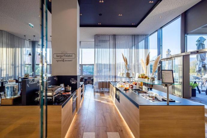 Imagen del bar/restaurante del Aparthotel Harry's home, Steyr. Foto 2