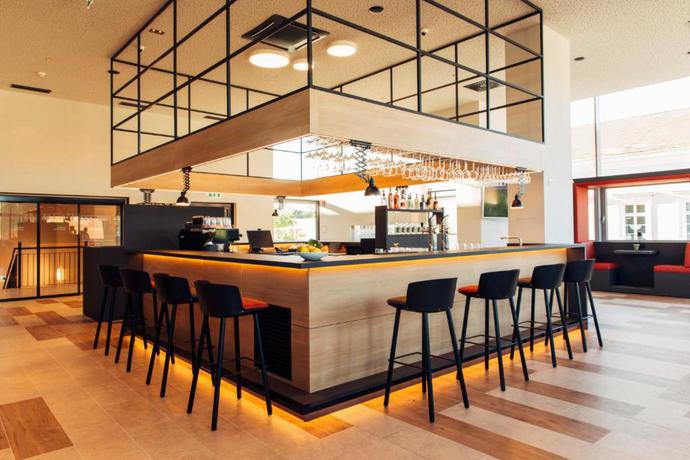 Imagen del bar/restaurante del Aparthotel Harry's home, Steyr. Foto 3