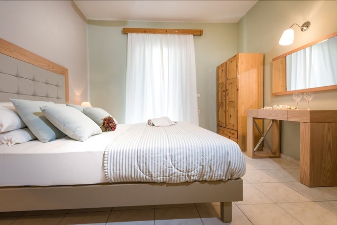 Imagen de la habitación del Aparthotel Hotel Plessas Palace. Foto 13