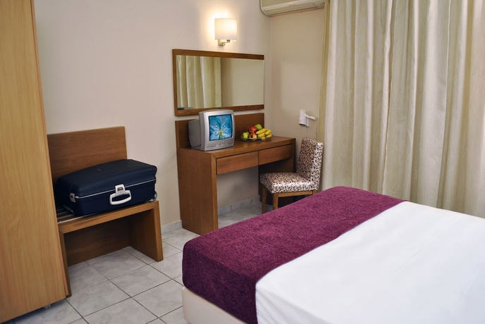 Imagen de la habitación del Aparthotel Hotel Plessas Palace. Foto 15