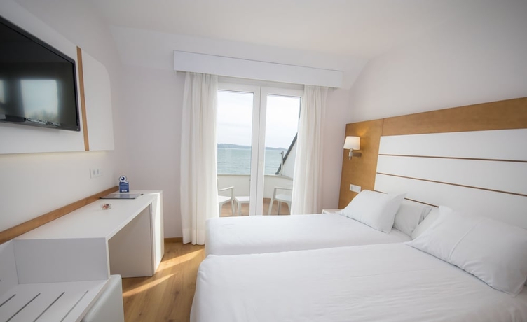 Imagen de la habitación del Aparthotel Hotel Spa Nanin Playa. Foto 5