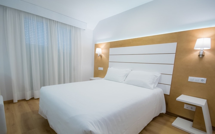 Imagen de la habitación del Aparthotel Hotel Spa Nanin Playa. Foto 9