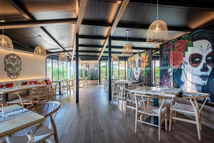 Imagen del bar/restaurante del Aparthotel Hotel Thb Sa Coma Platja. Foto 3