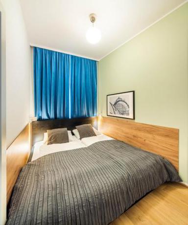 Imagen de la habitación del Aparthotel Jimmy's Apartments Emerald. Foto 13