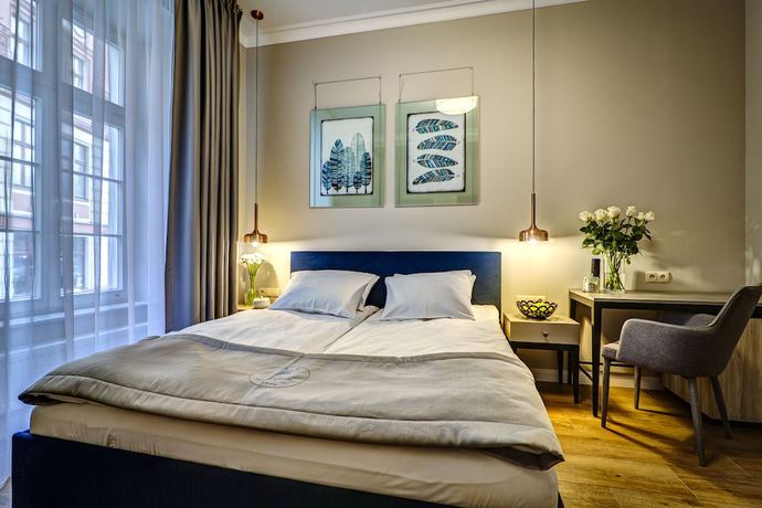Imagen de la habitación del Aparthotel Joyinn. Foto 16
