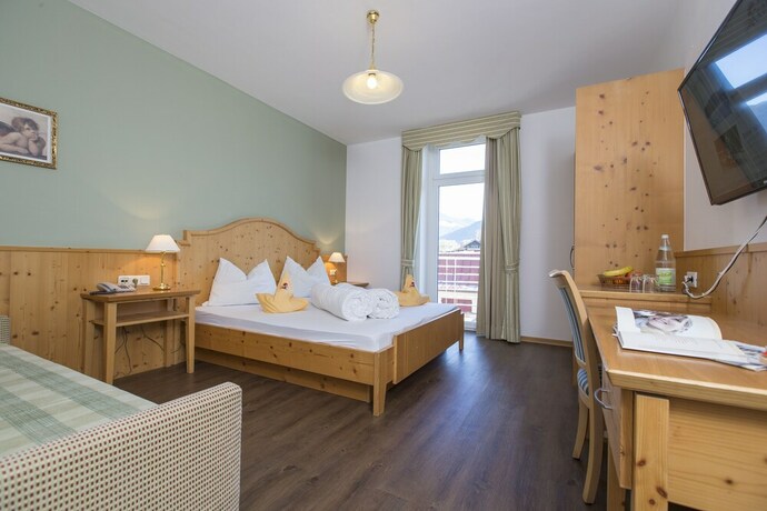 Imagen de la habitación del Aparthotel KRONPLATZ Luxury House. Foto 12