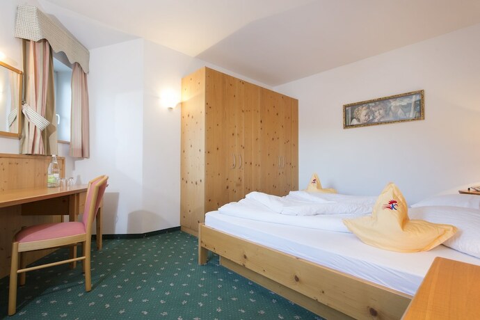 Imagen de la habitación del Aparthotel KRONPLATZ Luxury House. Foto 20