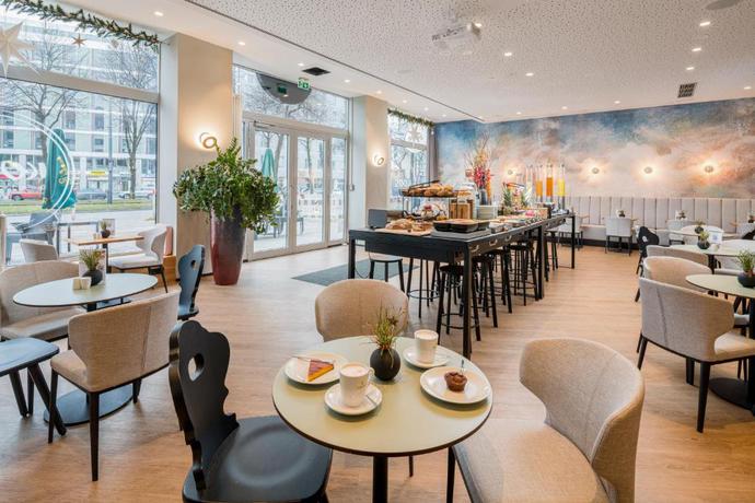 Imagen del bar/restaurante del Aparthotel Koos Hotel&Apartments. Foto 3