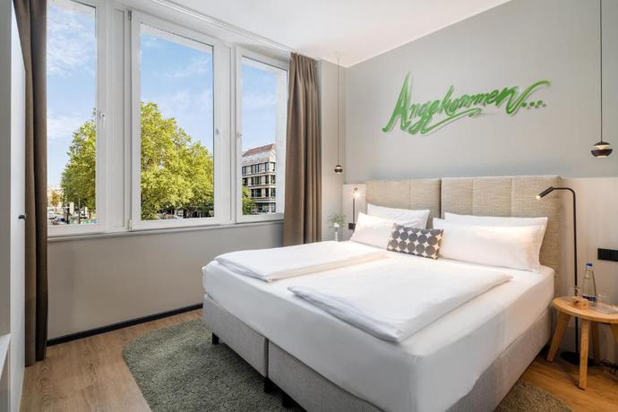 Imagen de la habitación del Aparthotel Koos Hotel&Apartments. Foto 14