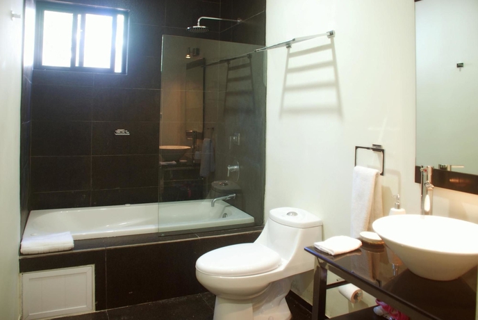 Imagen de la habitación del Aparthotel Koox La Mar Condhotel. Foto 1