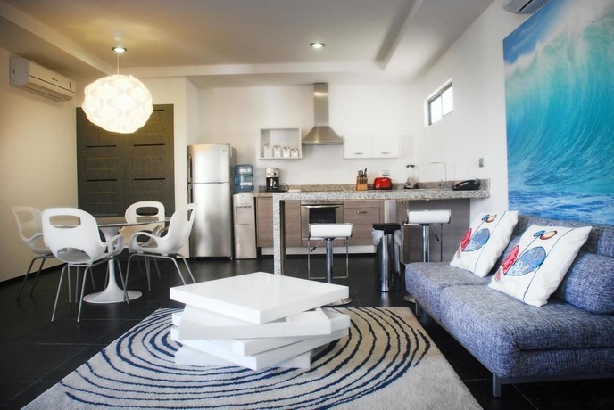 Imagen de la habitación del Aparthotel Koox La Mar Condhotel. Foto 2