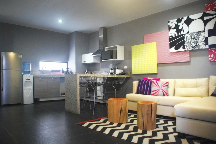Imagen de la habitación del Aparthotel Koox La Mar Condhotel. Foto 6