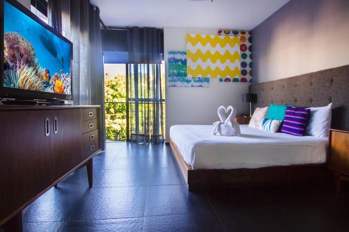 Imagen de la habitación del Aparthotel Koox La Mar Condhotel. Foto 10