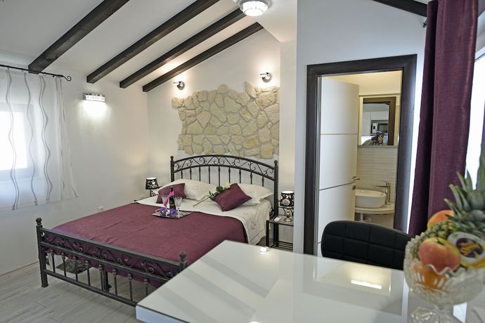 Imagen de la habitación del Aparthotel Kuzma Rooms. Foto 2