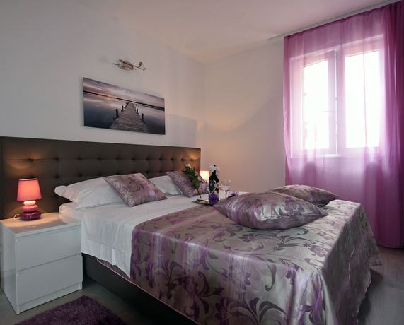 Imagen de la habitación del Aparthotel Kuzma Rooms. Foto 3
