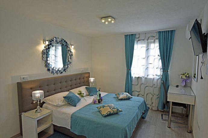 Imagen de la habitación del Aparthotel Kuzma Rooms. Foto 4