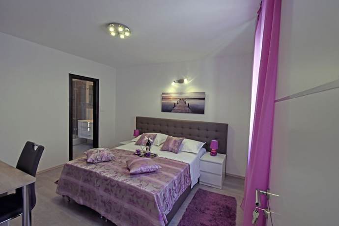 Imagen de la habitación del Aparthotel Kuzma Rooms. Foto 5