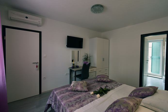 Imagen de la habitación del Aparthotel Kuzma Rooms. Foto 7