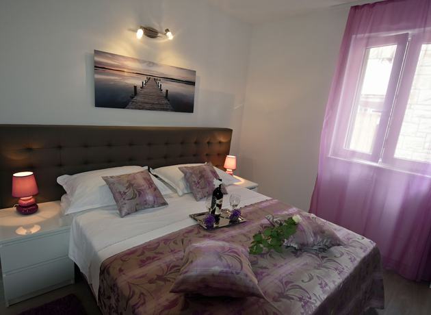 Imagen de la habitación del Aparthotel Kuzma Rooms. Foto 10