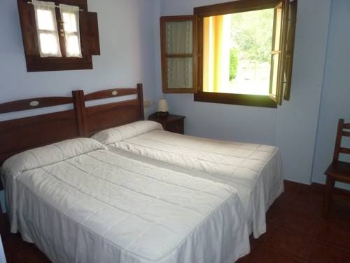 Imagen de la habitación del Aparthotel La Hortona. Foto 8