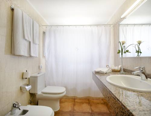 Imagen de la habitación del Aparthotel La Pergola Mallorca. Foto 16