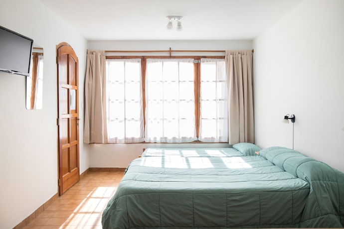 Imagen de la habitación del Aparthotel La Ponderosa. Foto 17