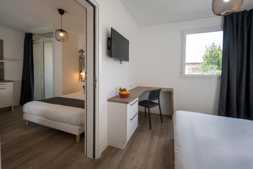 Imagen de la habitación del Aparthotel Lagrange Mulhouse. Foto 4
