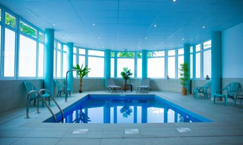 Imagen de la piscina del Aparthotel Lagrange Mulhouse. Foto 7