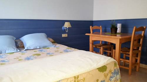 Imagen de la habitación del Aparthotel Les Corts. Foto 6
