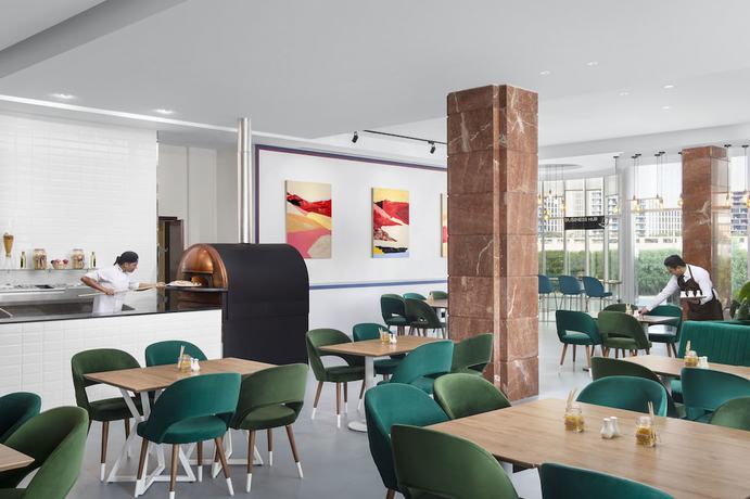Imagen del bar/restaurante del Aparthotel Leva & Suites, Mazaya Centre. Foto 3