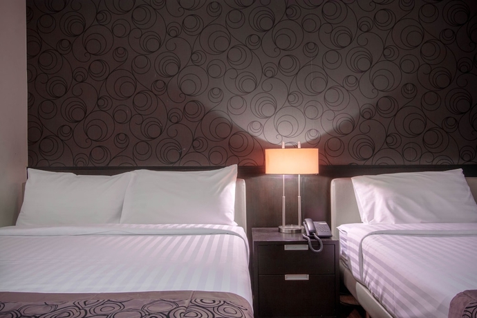 Imagen de la habitación del Aparthotel Lily Hotel Bangkok. Foto 5