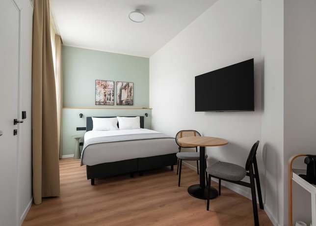 Imagen de la habitación del Aparthotel Limehome Athens Geraniou. Foto 8