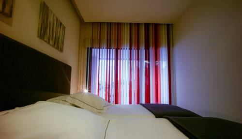 Imagen de la habitación del Aparthotel Limehome Barcelona Rector Triad&oacute;. Foto 5