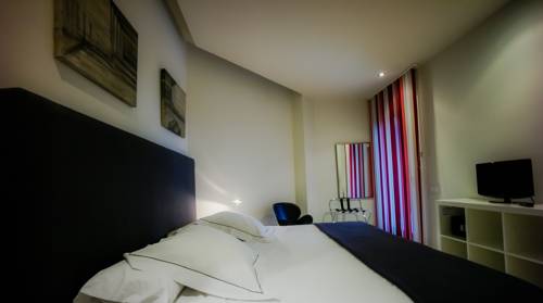 Imagen de la habitación del Aparthotel Limehome Barcelona Rector Triad&oacute;. Foto 9