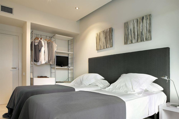 Imagen de la habitación del Aparthotel Limehome Barcelona Rector Triad&oacute;. Foto 12